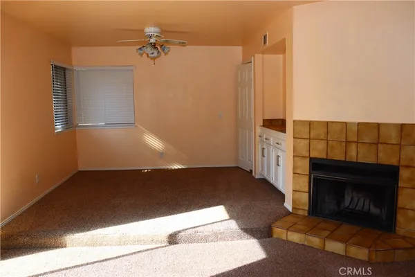 a view of a livingroom with a fireplace