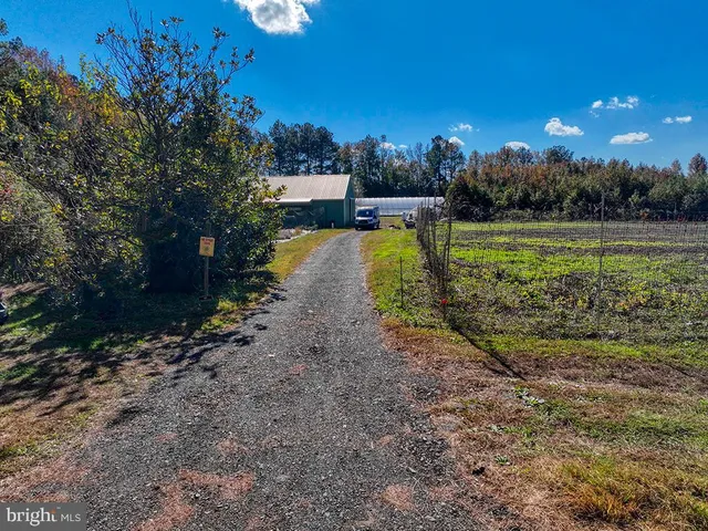 a view of a lake with a yard