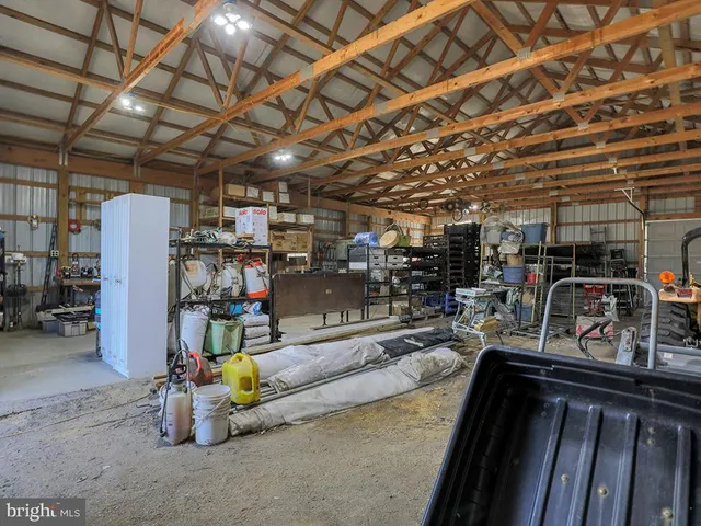 a view of parking garage with cars