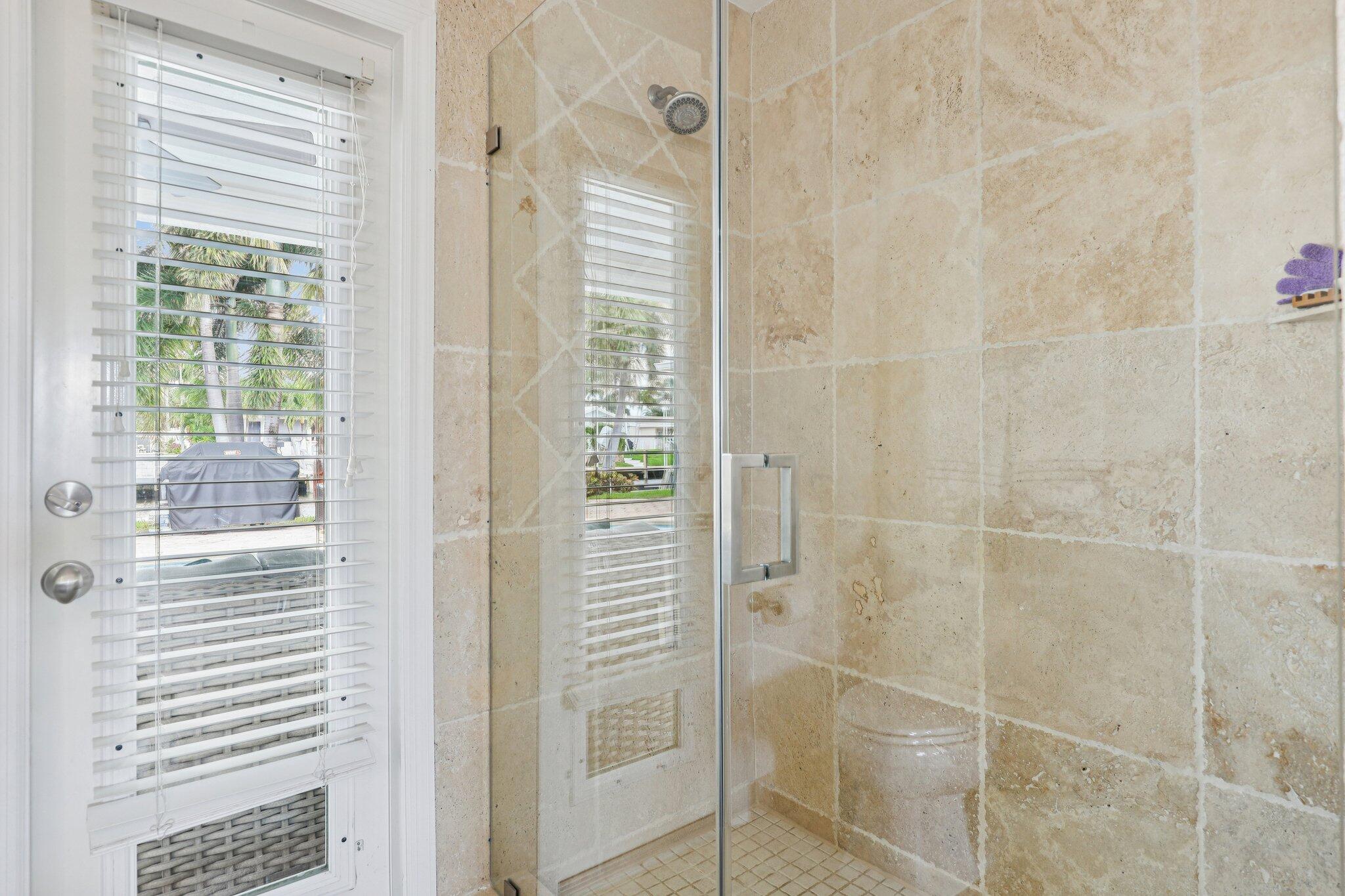 2731 Northeast 5th Street Pompano Beach, FL 33062 - Photo 24 of 91 a bathroom with a shower