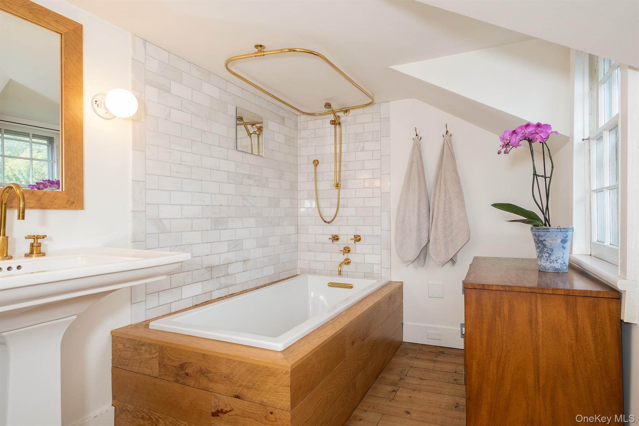 77 Upper Hook Road Rhinebeck, NY 12572 - Photo 23 of 48 a bathroom with a tub sink and mirror