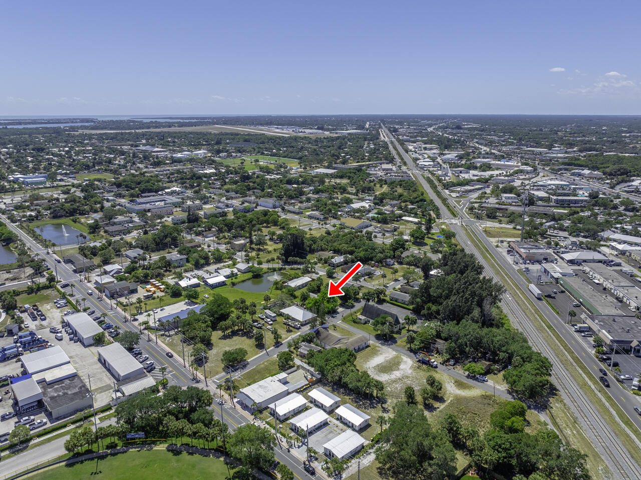 801 Central Avenue Stuart, FL 34994 - Photo 5 of 12 an aerial view of a city