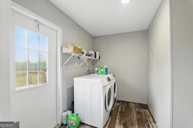 a utility room with dryer and washer