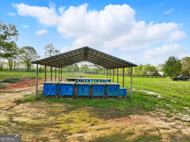 a view of a yard with an outdoor space