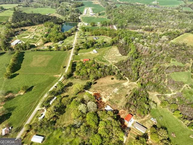 a view of a lake with a yard