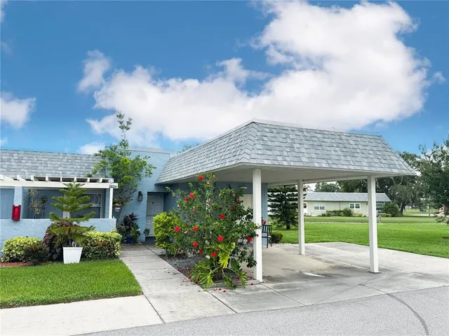 a house view with a garden space