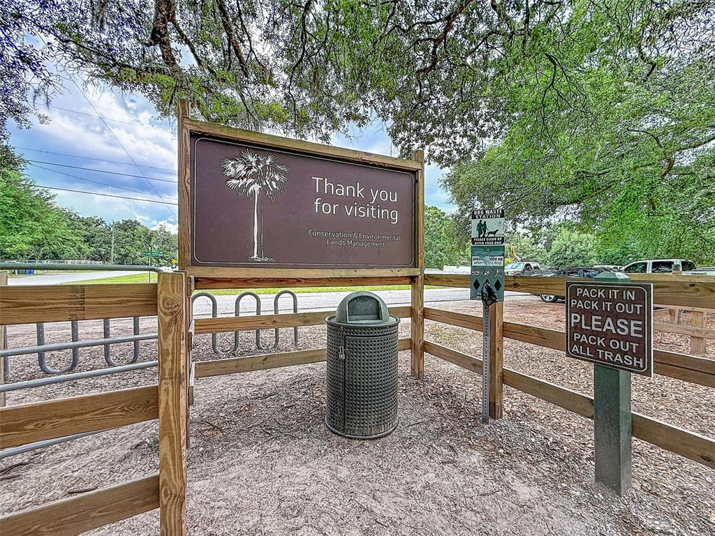 1819 Sinclair Hills Road Lutz, FL 33549 - Photo 58 of 60 a view of a street with benches in the background