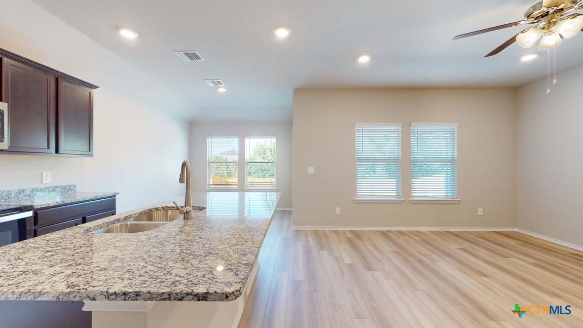 549 Hector Loop Georgetown, TX 78626 - Photo 10 of 22 a view of a kitchen and kitchen