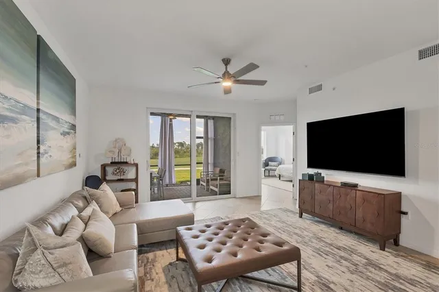 a bedroom with a bed furniture and a window