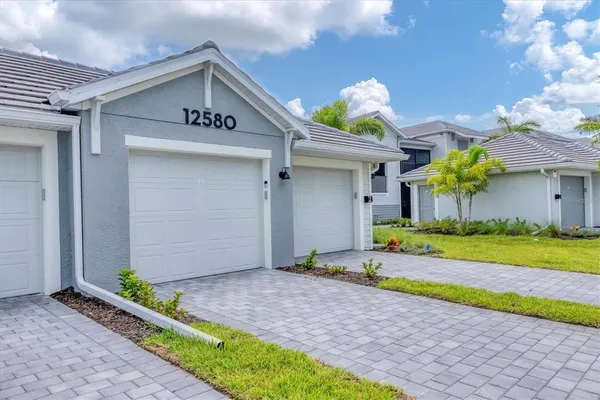 a front view of house with an outdoor space