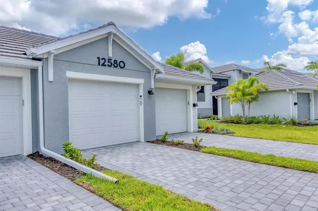 a front view of house with an outdoor space