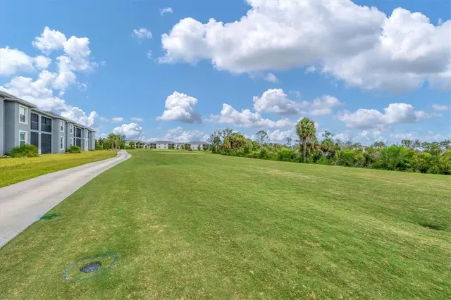 a view of a lake with outdoor space