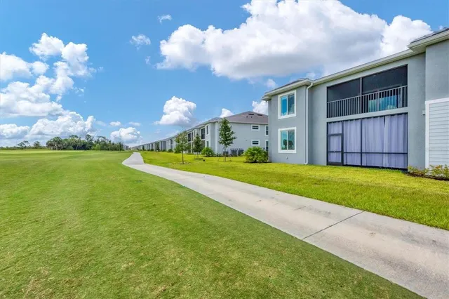 a view of a balcony with chairs
