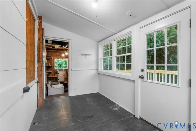 an empty room with windows