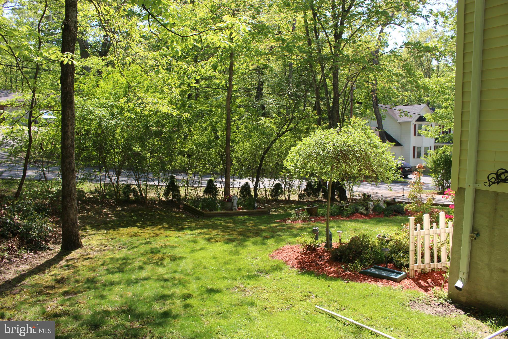 330 Red Cloud Road Lusby, MD 20657 - Photo 7 of 30 a view of a yard with swimming pool