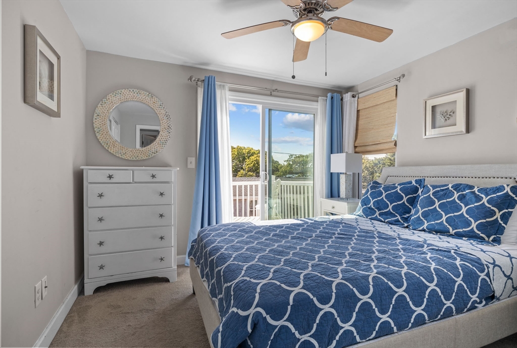 17 5th Street Wareham, MA 02558 - Photo 17 of 32 a bedroom with a large bed and a window