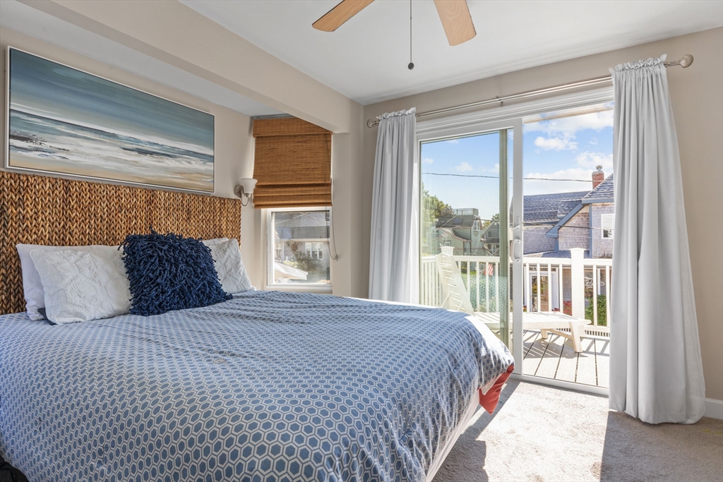 17 5th Street Wareham, MA 02558 - Photo 22 of 32 a bedroom with a large bed and a large window