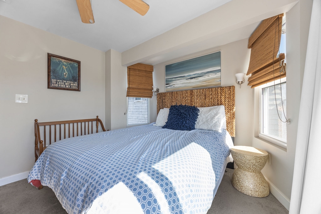 17 5th Street Wareham, MA 02558 - Photo 23 of 32 a bedroom with a bed and wooden floor