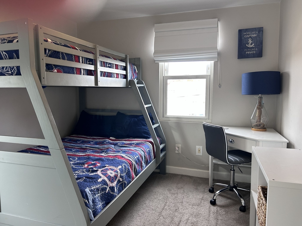 17 5th Street Wareham, MA 02558 - Photo 24 of 32 a bedroom with a bed and a window