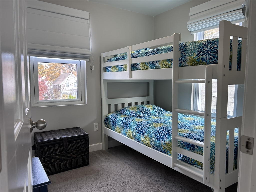 17 5th Street Wareham, MA 02558 - Photo 27 of 32 a bedroom with a bed and a window