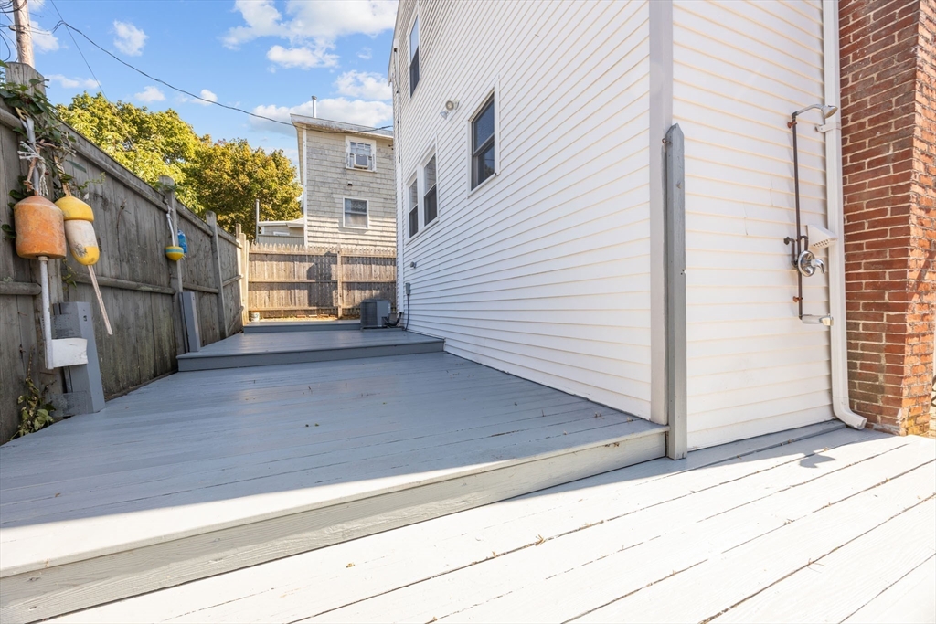 17 5th Street Wareham, MA 02558 - Photo 29 of 32 a view of a house with a door and wooden floor
