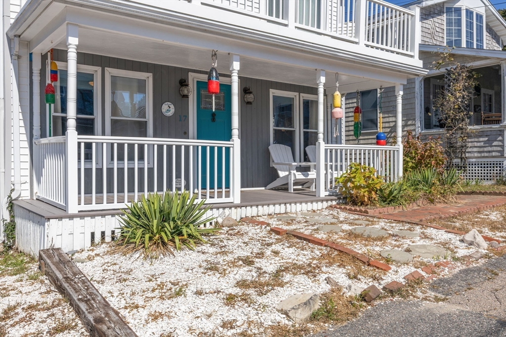 17 5th Street Wareham, MA 02558 - Photo 32 of 32 front view of a brick house with a small yard