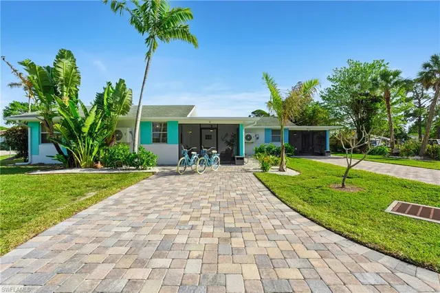 a view of a house with a swimming pool