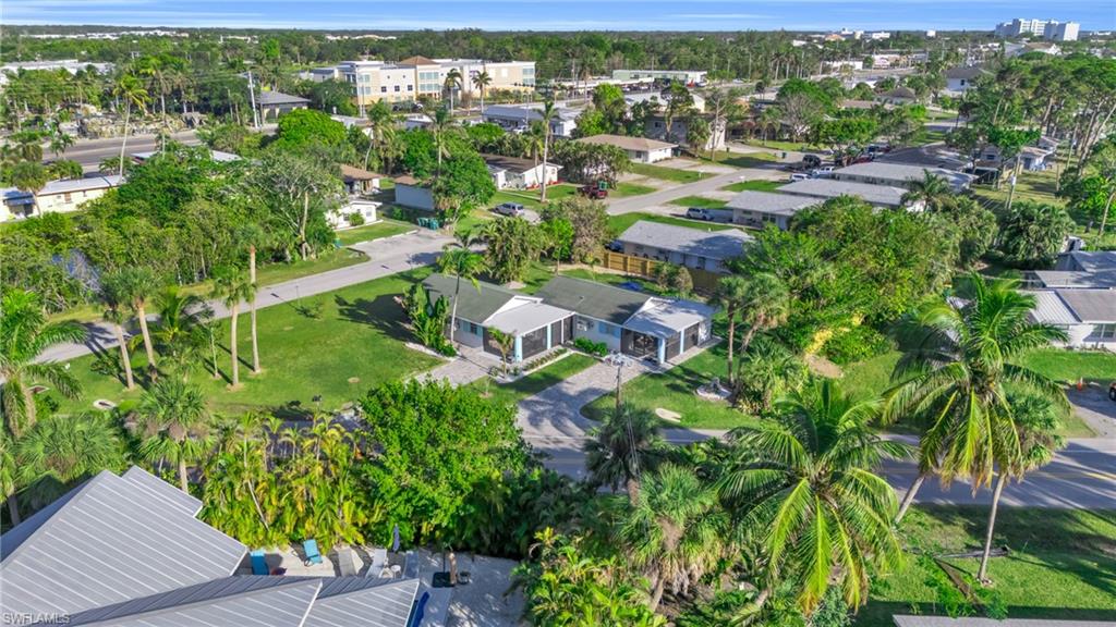 2134 Palm Street Naples, FL 34112 - Photo 26 of 36 an aerial view of residential houses with outdoor space and trees