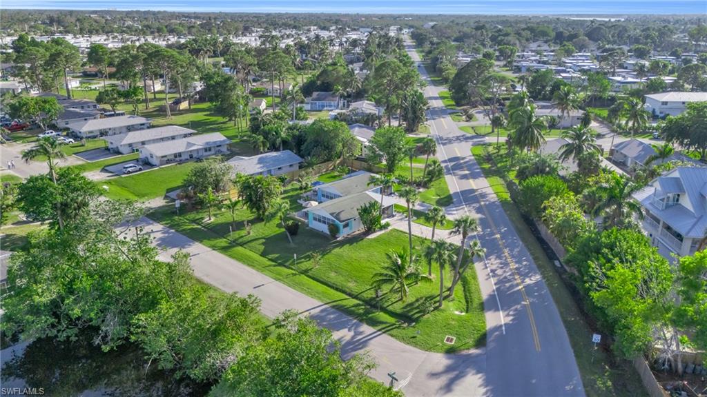 2134 Palm Street Naples, FL 34112 - Photo 27 of 36 an aerial view of residential houses with outdoor space