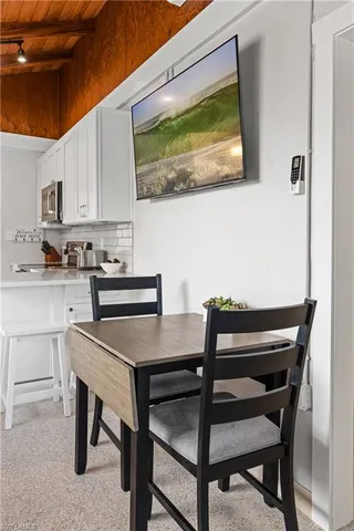 a view of a dining room with furniture