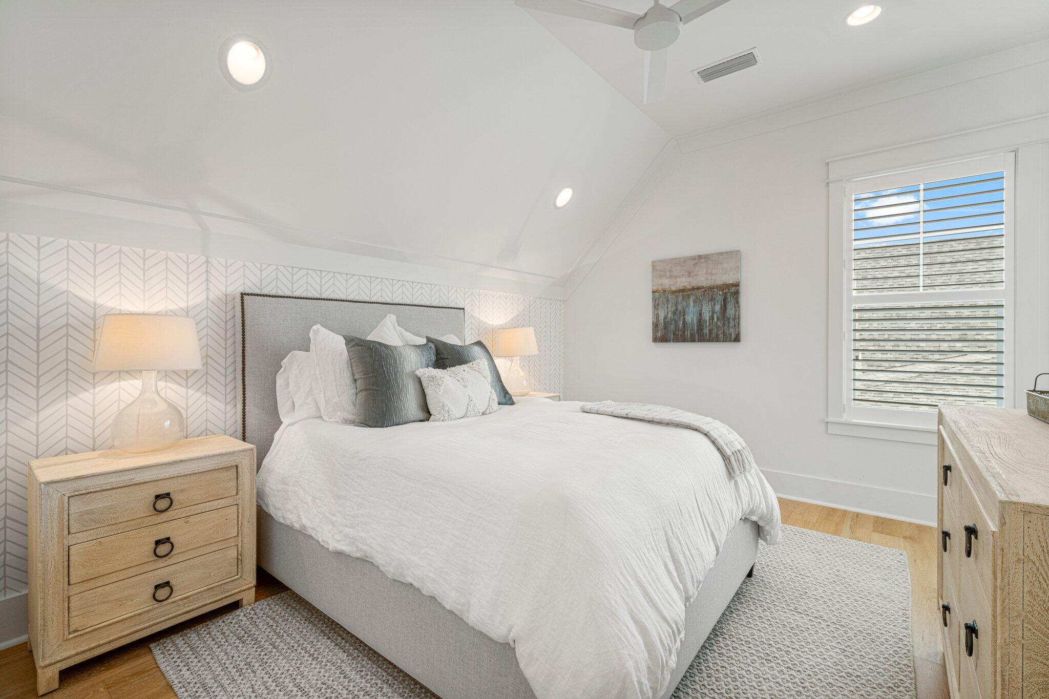 916 Pathways Dr Inlet Beach Inlet Beach, FL 32461 - Photo 32 of 48 a bedroom with a bed and a night stand