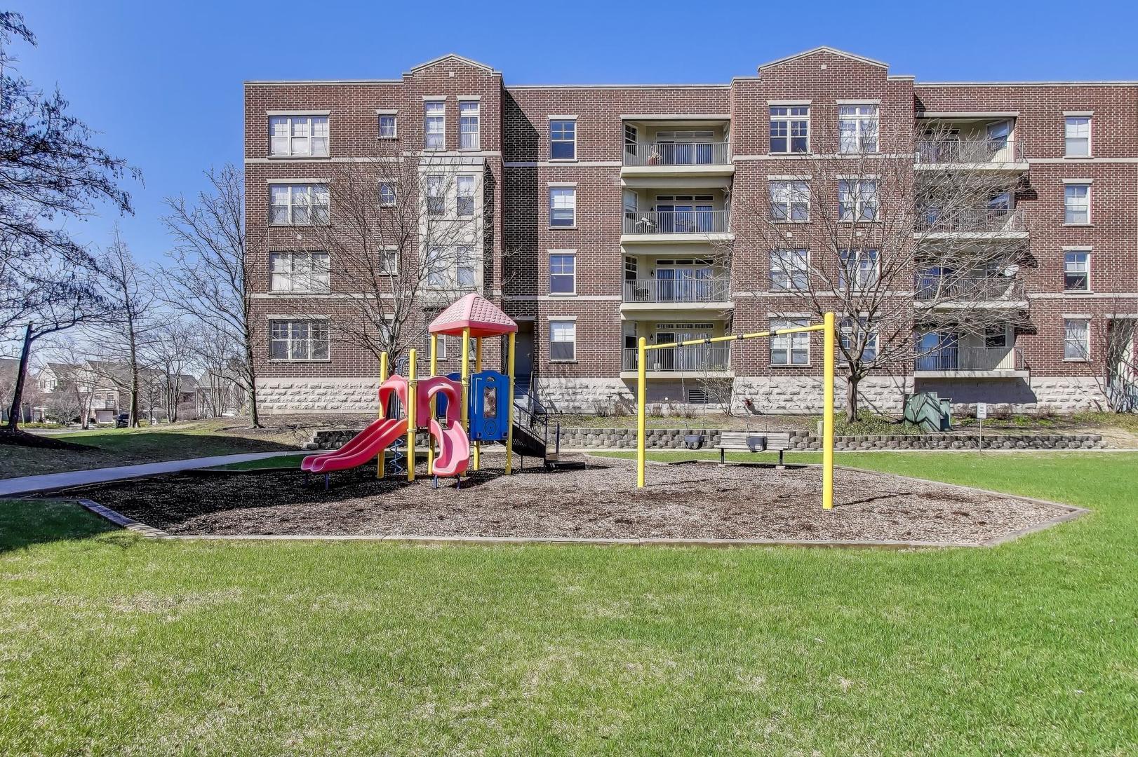 715 Astor Lane, Unit 307 Wheeling, IL 60090 - Photo 34 of 38 a view of a multi story building