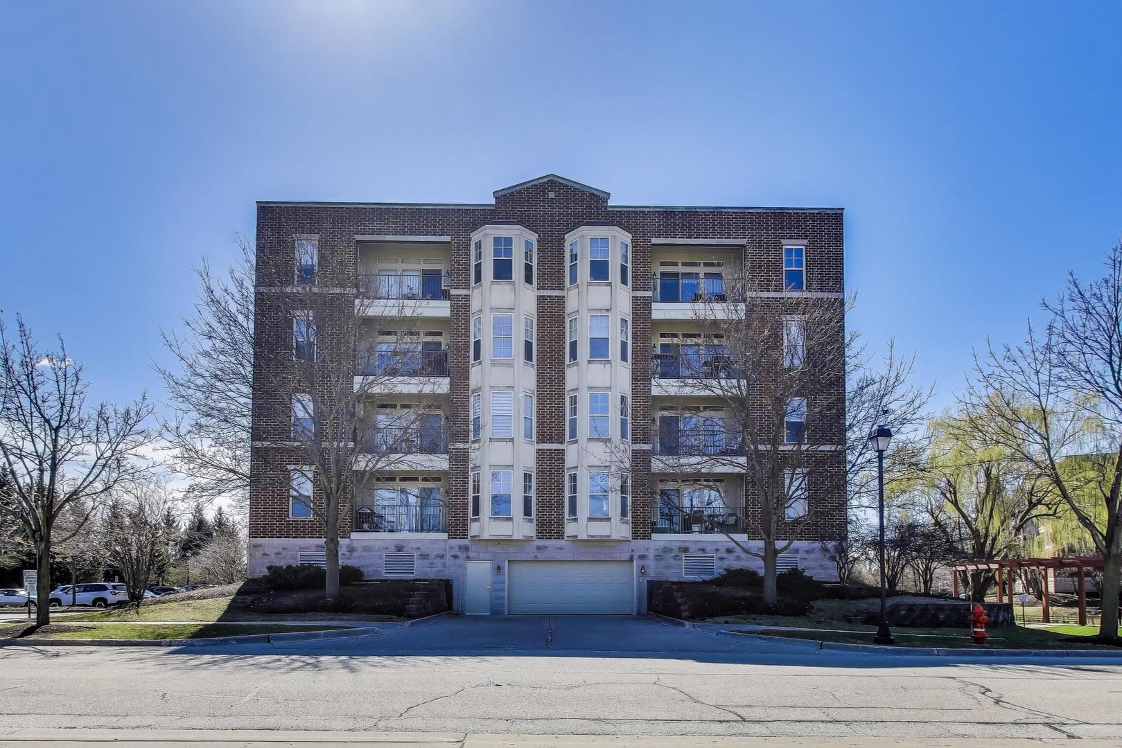 715 Astor Lane, Unit 307 Wheeling, IL 60090 - Photo 38 of 38 a front view of a building