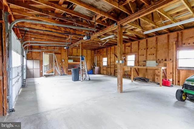a view of a balcony with chairs