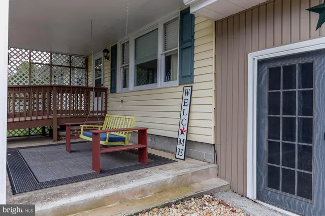 a view of a tree in front of a house