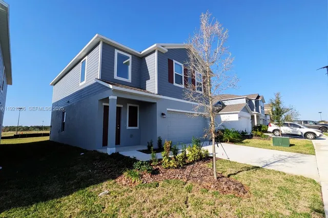 a view of a house with a patio