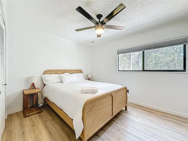 a view of city and green space