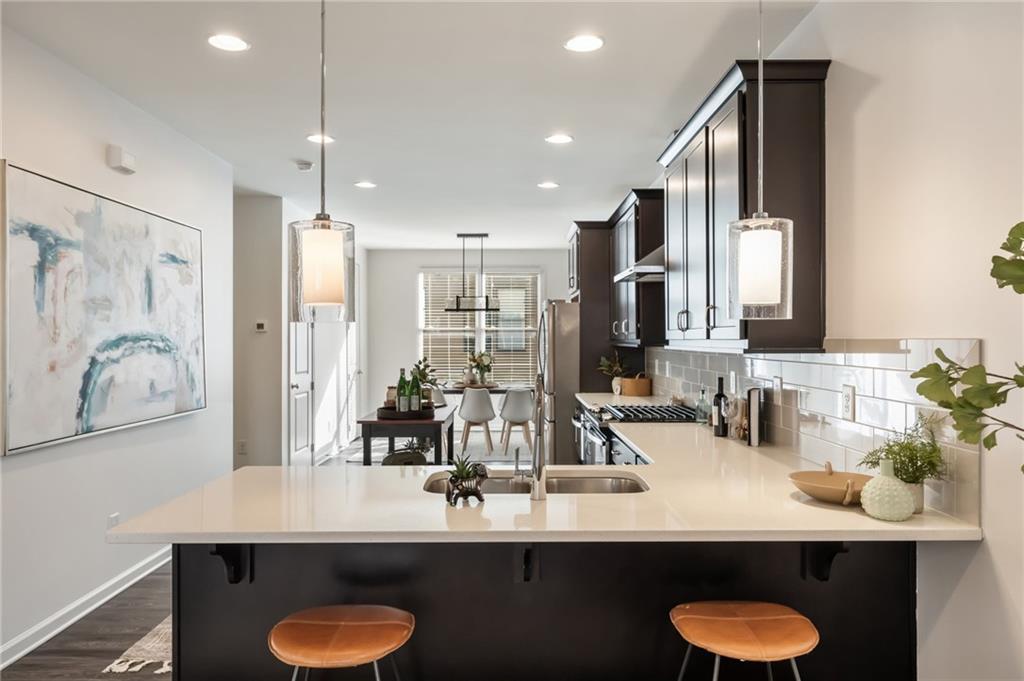 754 Aerial Way Atlanta, GA 30312 - Photo 1 of 1 a bathroom with a sink double vanity and a mirror
