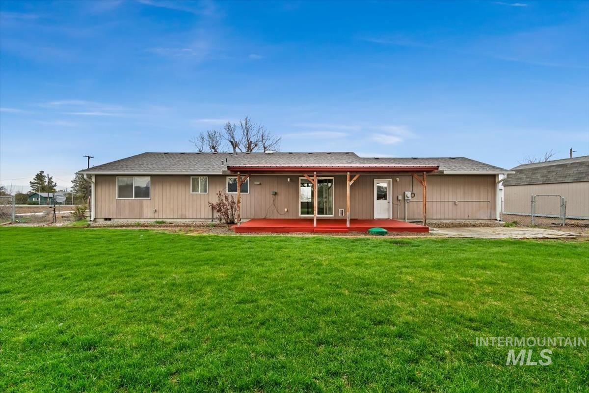 1051 Haas Road Weiser, ID 83672 - Photo 32 of 44 Back of house featuring a shingled roof
