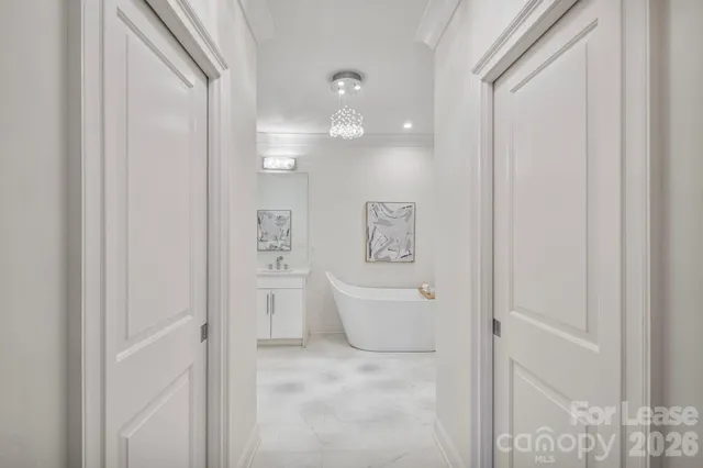 a kitchen with stainless steel appliances kitchen island granite countertop a stove a sink and a microwave