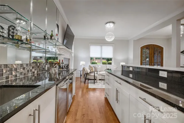 a large kitchen with lots of counter space and window