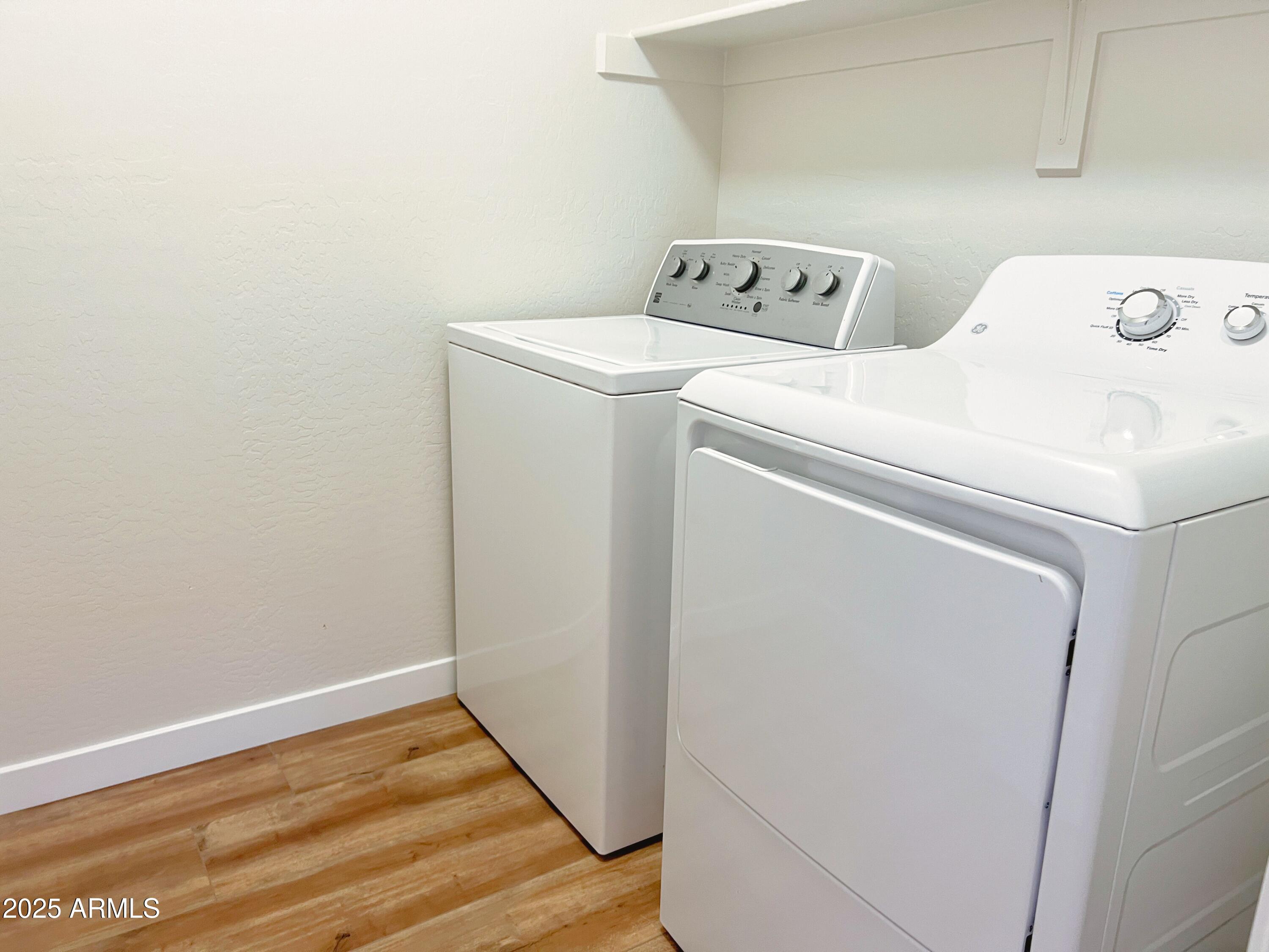 5415 East McKellips Road, Unit 90 Mesa, AZ 85215 - Photo 14 of 16 a utility room with dryer and washer