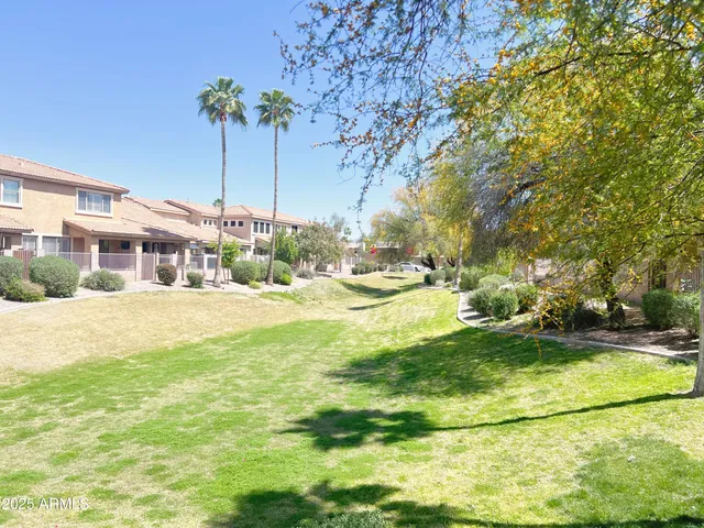 a house view with swimming pool