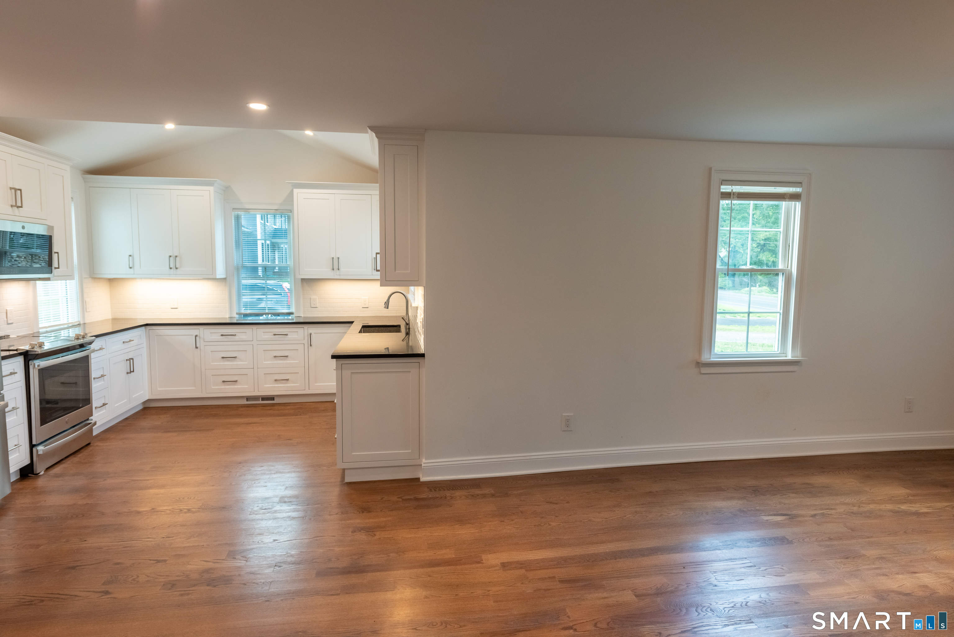 Open kitchen flows into the dining area
