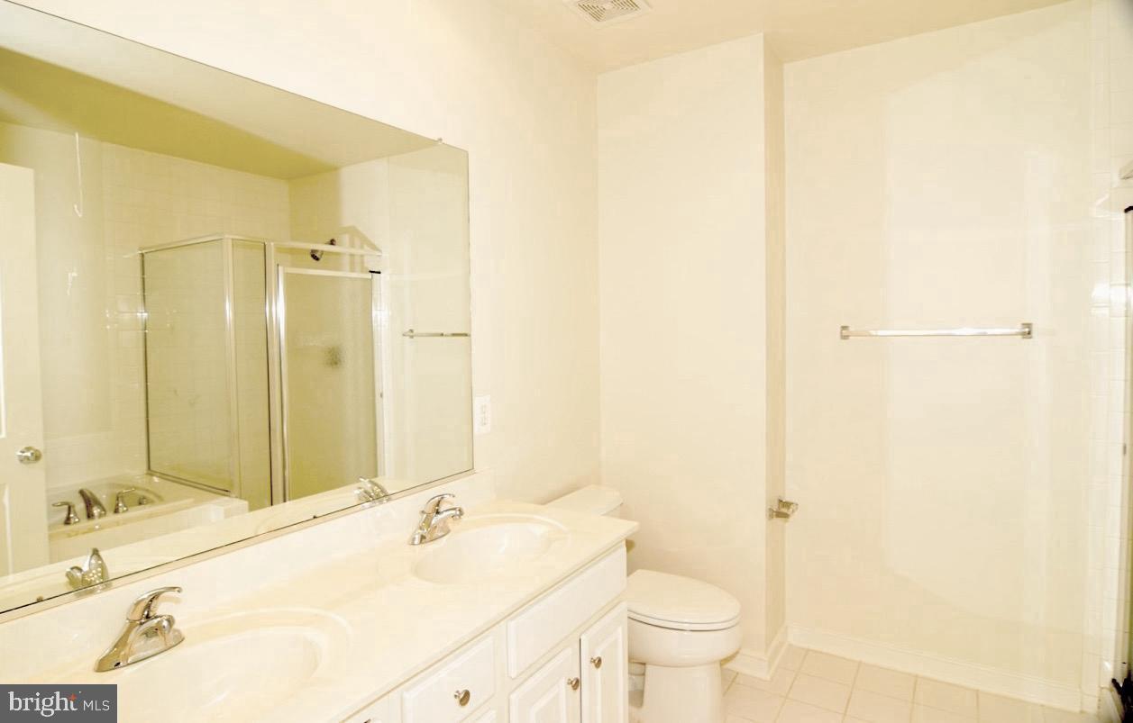 11036 Amherst Avenue Silver Spring, MD 20902 - Photo 11 of 20 FULL BATH WITH DOUBLE VANITIES