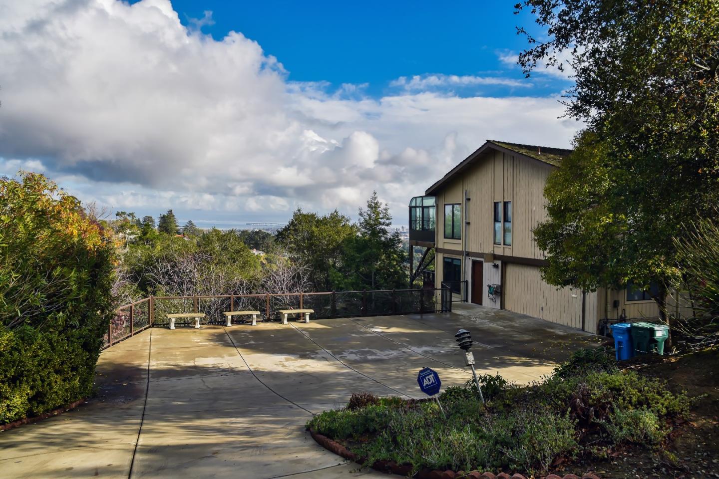 15 Anson Road Hillsborough, CA 94010 - Photo 1 of 18 a front view of a house with a yard