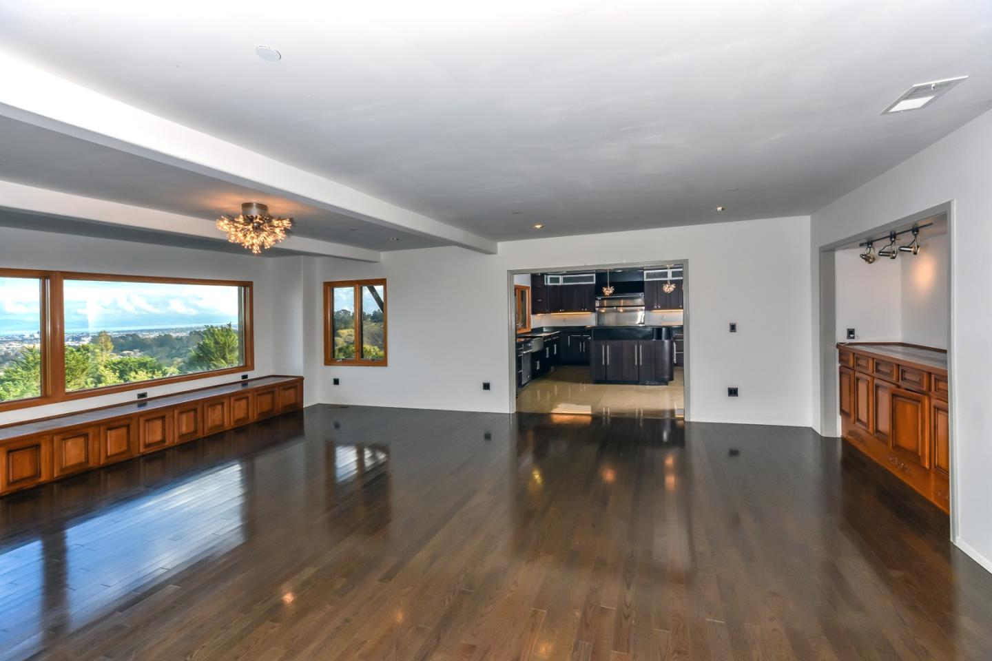15 Anson Road Hillsborough, CA 94010 - Photo 3 of 18 a view of a living room and hardwood floor