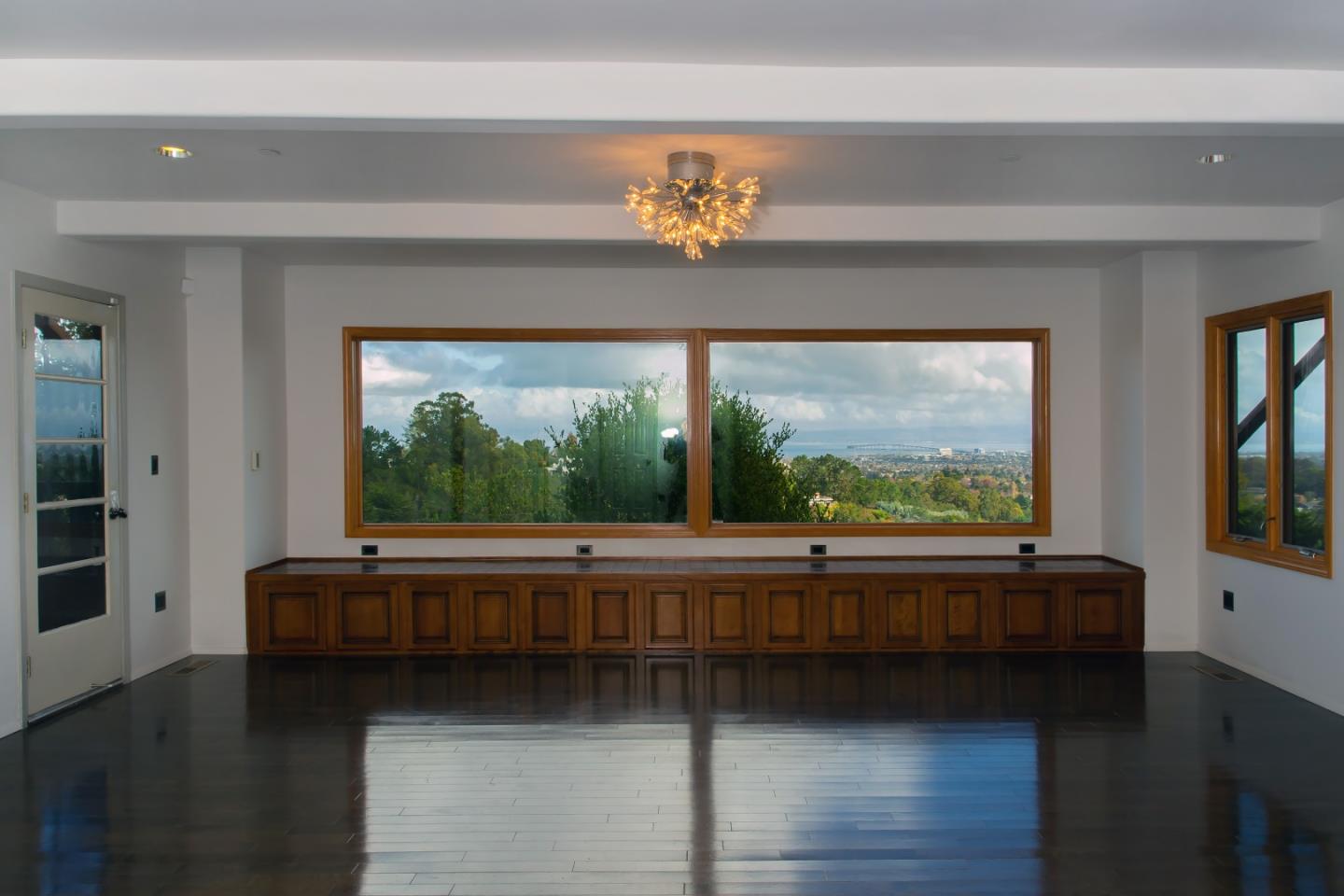 15 Anson Road Hillsborough, CA 94010 - Photo 4 of 18 a living room with furniture and a large window
