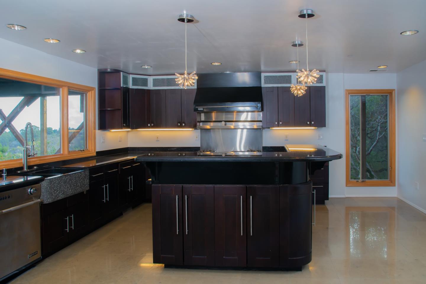 15 Anson Road Hillsborough, CA 94010 - Photo 10 of 18 a kitchen with a sink and a wooden floor