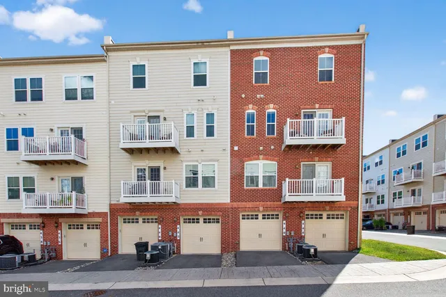 a front view of a building with street view